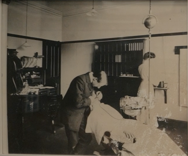 Archive photograph of an early Bournville dental surgery in use