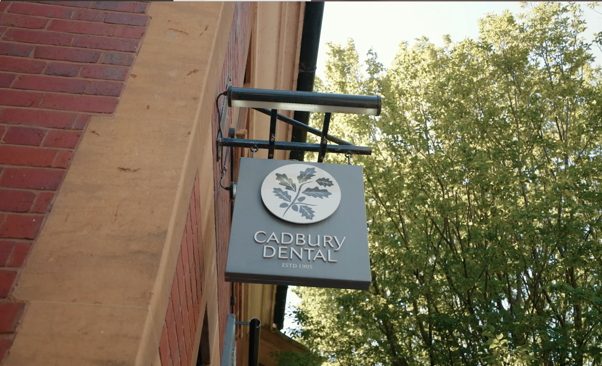Cadbury Dental practice sign outside the Bournville, Birmingham clinic